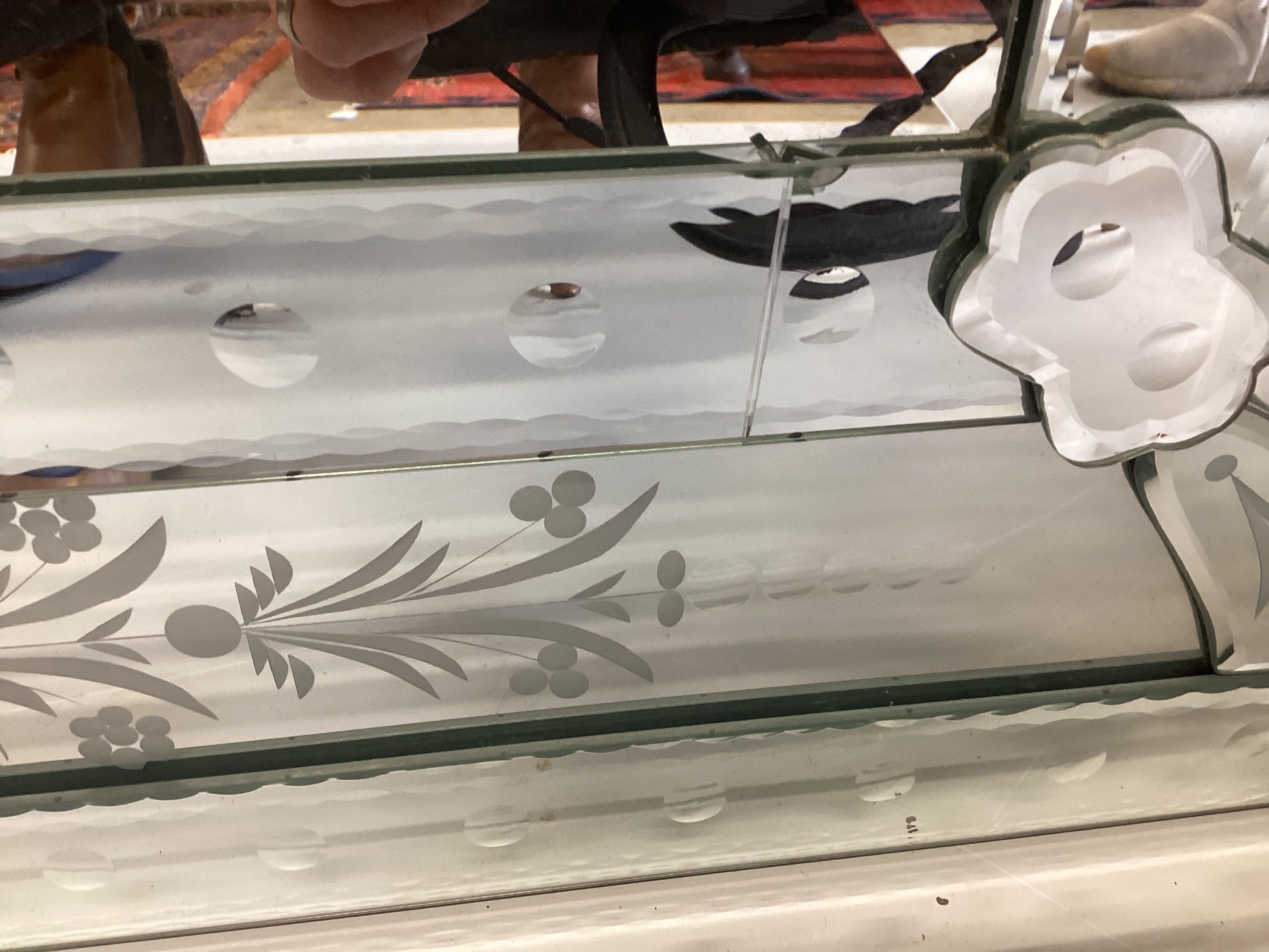A Venetian style engraved glass overmantel mirror, width 150cm, height 115cm